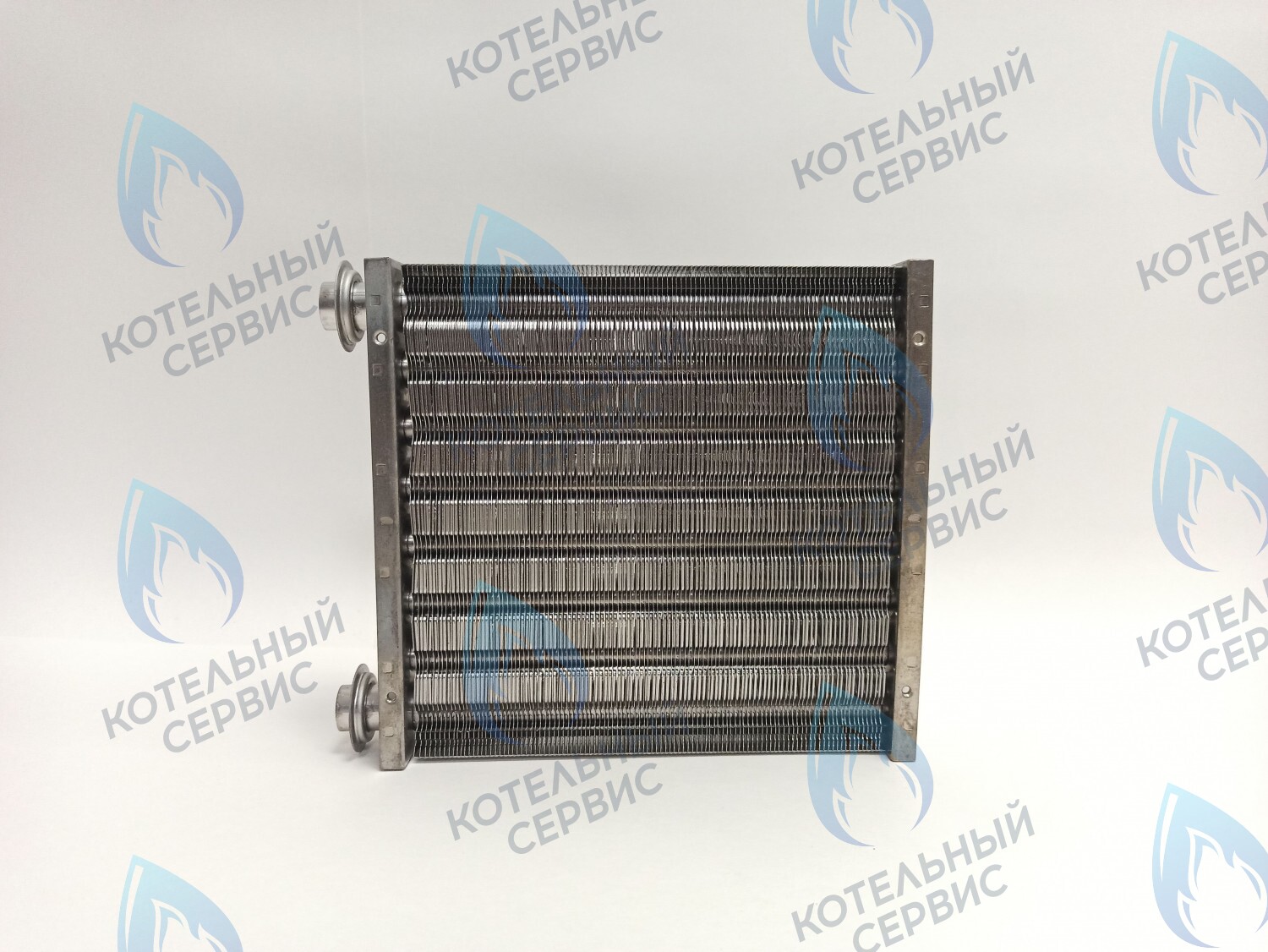 EM052-195 Теплообменник основной (первичный) Navien (с белыми прокладками в комплекте) Deluxe Е 10-24K. в Санкт-Петербурге